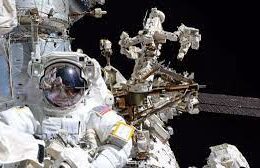 After a one-day delay due to space debris astronauts finally begin their spacewalk.