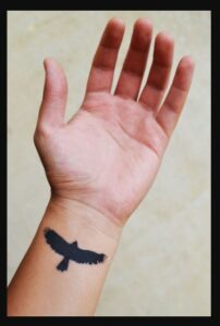 Small Forearm Raven Tattoo