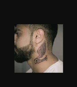Blessed Tattoo with Wing on Neck