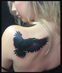Raven Tattoo Designs On Shoulder With Red Ink