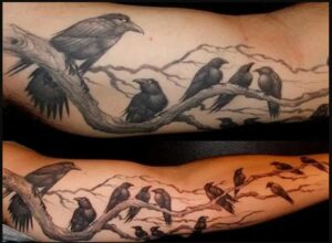 Feminine Raven Tattoo Designs on Leg