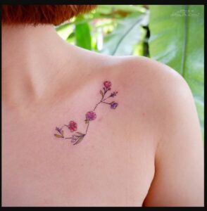 Feminine Floral Scorpio Tattoo