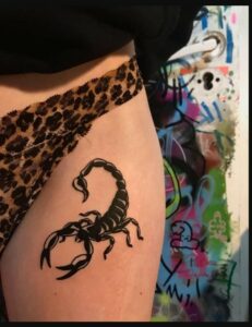 Black Small Scorpion Tattoo