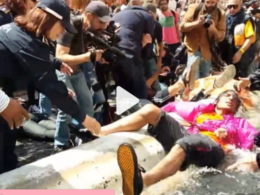 Charcoal is dumped in the Trevi Fountain by climate protestors in Rome.