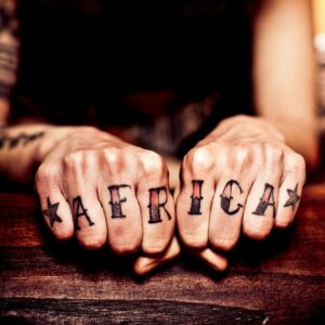Bold Letters Knuckle Tattoo
