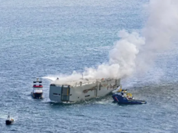 A crew member perished when a vessel transporting 3000 cars caught fire off the Dutch coast.
