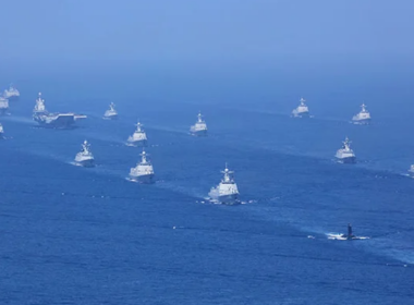 The United States and China conduct rival exercises in the contested South China Sea.